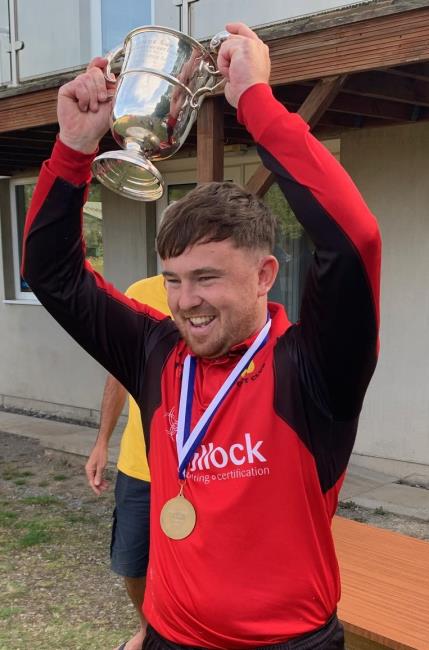 Jacob Knox raises the Alec Colley Cup